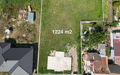 stavební pozemek s projektem rodinného domu 1548